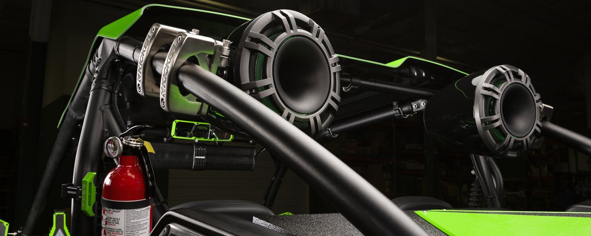 KICKER speakers mounted behind the Kawasaki UTV seats