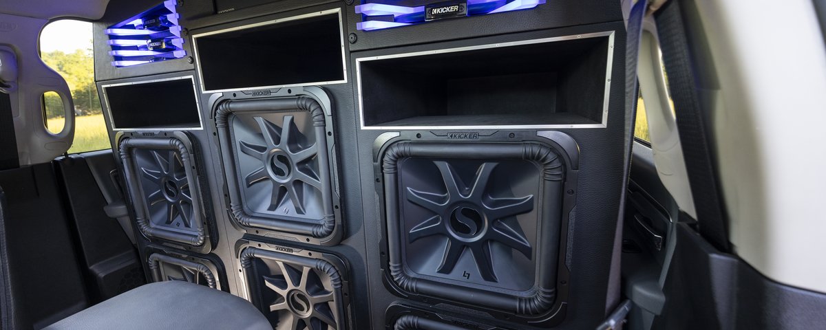 Custom Ram rear-cabin speaker wall with blue lighting