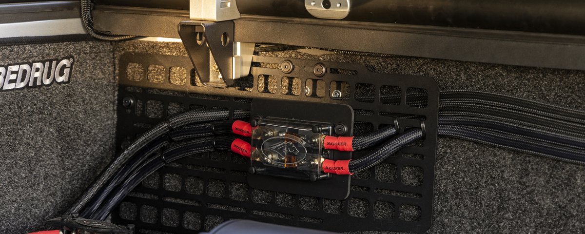 KICKER amplifier and wiring installation in the Ram bed
