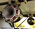 Close view of a KICKER speaker in the Ram truck bed