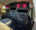 Custom Ram rear-cabin speaker wall with red lighting