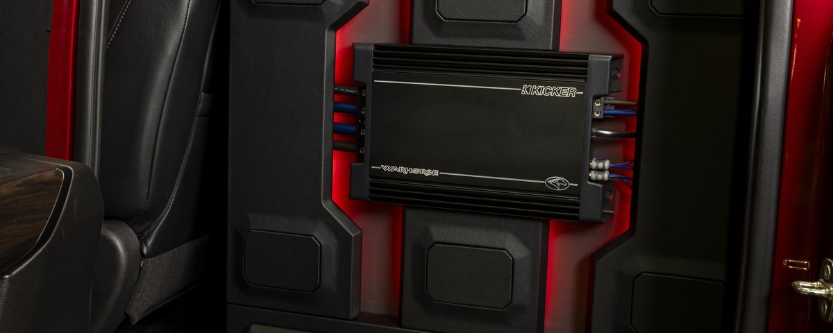 KICKER amplifier installation behind the Sierra seat