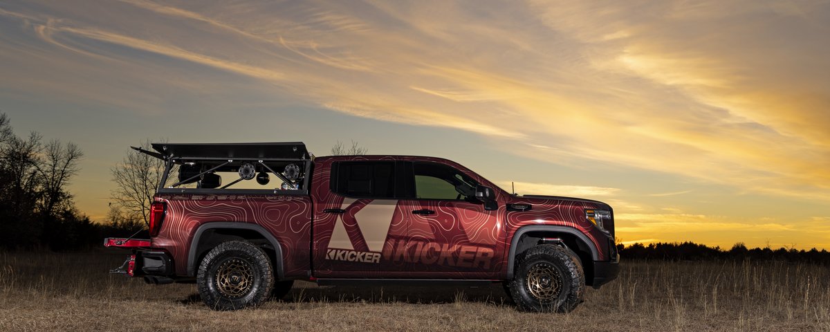 GMC Sierra side profile at sunset