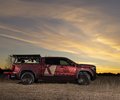 GMC Sierra side profile at sunset