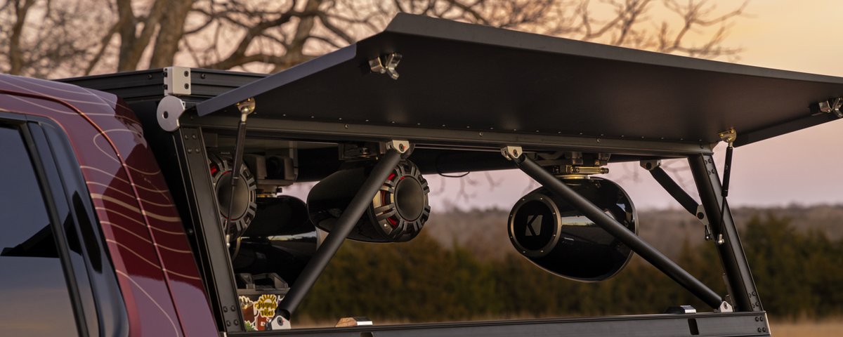 Sierra truck-bed audio system lift structure