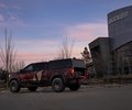 GMC Sierra side profile outside KICKER headquarters