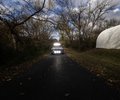 Subaru CrossTrek on a dark road