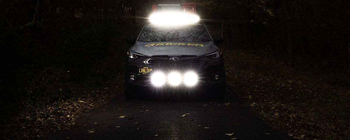 Subaru CrossTrek front lighting illuminated at night