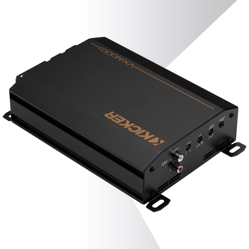 Angled top view of KICKER VXA car amplifier showing compact design and side terminal connections.