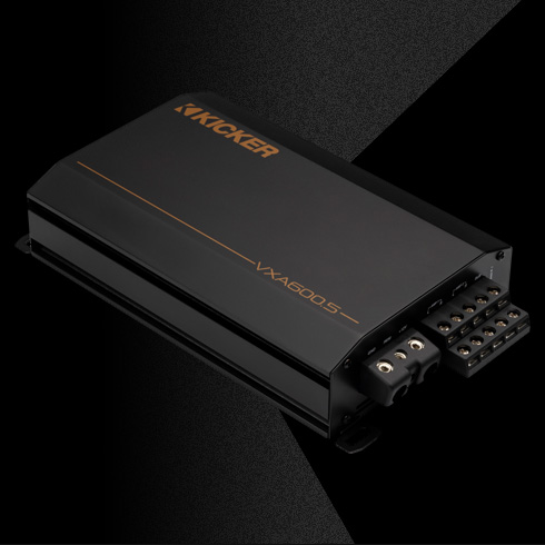 KICKER VXA600.5 amplifier with rugged black enclosure and logo visible on top.