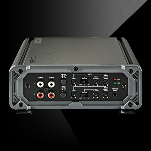 Rear view of a CX KICKER car amplifier showing RCA inputs, tuning controls, and power indicators.