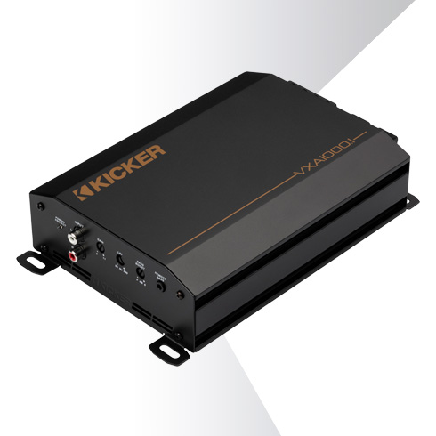 Angled top view of KICKER CXA800.1 car amplifier showing compact design and side terminal connections.